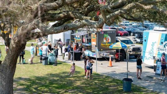 Families gathered along the oceanfront at Myrtle Beach State Park for a colorful day of kite flying during the annual Kite Festival.