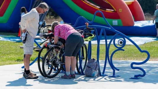 Families gathered along the oceanfront at Myrtle Beach State Park for a colorful day of kite flying during the annual Kite Festival.