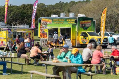 Families gathered along the oceanfront at Myrtle Beach State Park for a colorful day of kite flying during the annual Kite Festival.