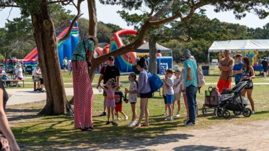 Families gathered along the oceanfront at Myrtle Beach State Park for a colorful day of kite flying during the annual Kite Festival.