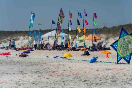Families gathered along the oceanfront at Myrtle Beach State Park for a colorful day of kite flying during the annual Kite Festival.
