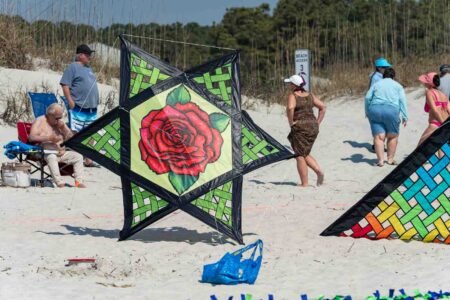 Families gathered along the oceanfront at Myrtle Beach State Park for a colorful day of kite flying during the annual Kite Festival.