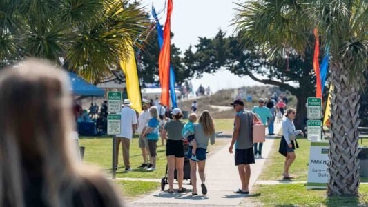Families gathered along the oceanfront at Myrtle Beach State Park for a colorful day of kite flying during the annual Kite Festival.