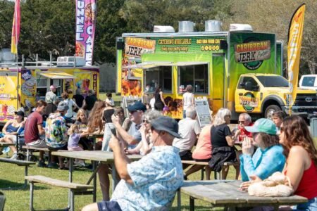 Families gathered along the oceanfront at Myrtle Beach State Park for a colorful day of kite flying during the annual Kite Festival.