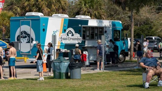 Families gathered along the oceanfront at Myrtle Beach State Park for a colorful day of kite flying during the annual Kite Festival.