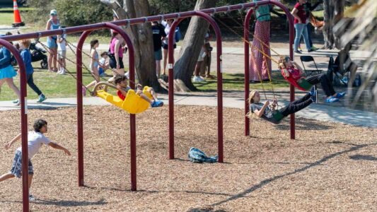 Families gathered along the oceanfront at Myrtle Beach State Park for a colorful day of kite flying during the annual Kite Festival.